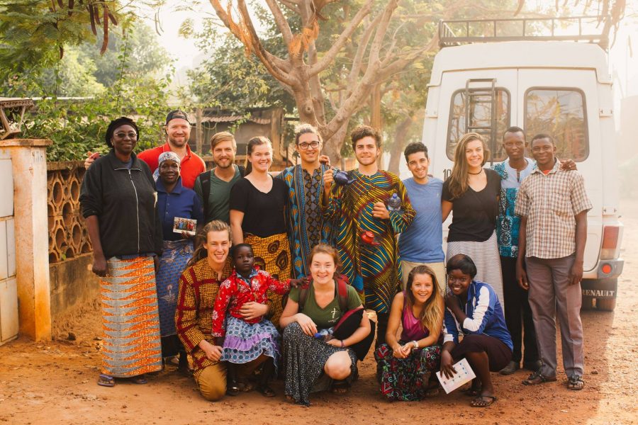 Liam Kachkar (in the blue shirt) with Outtatown in Burkina Faso last semester