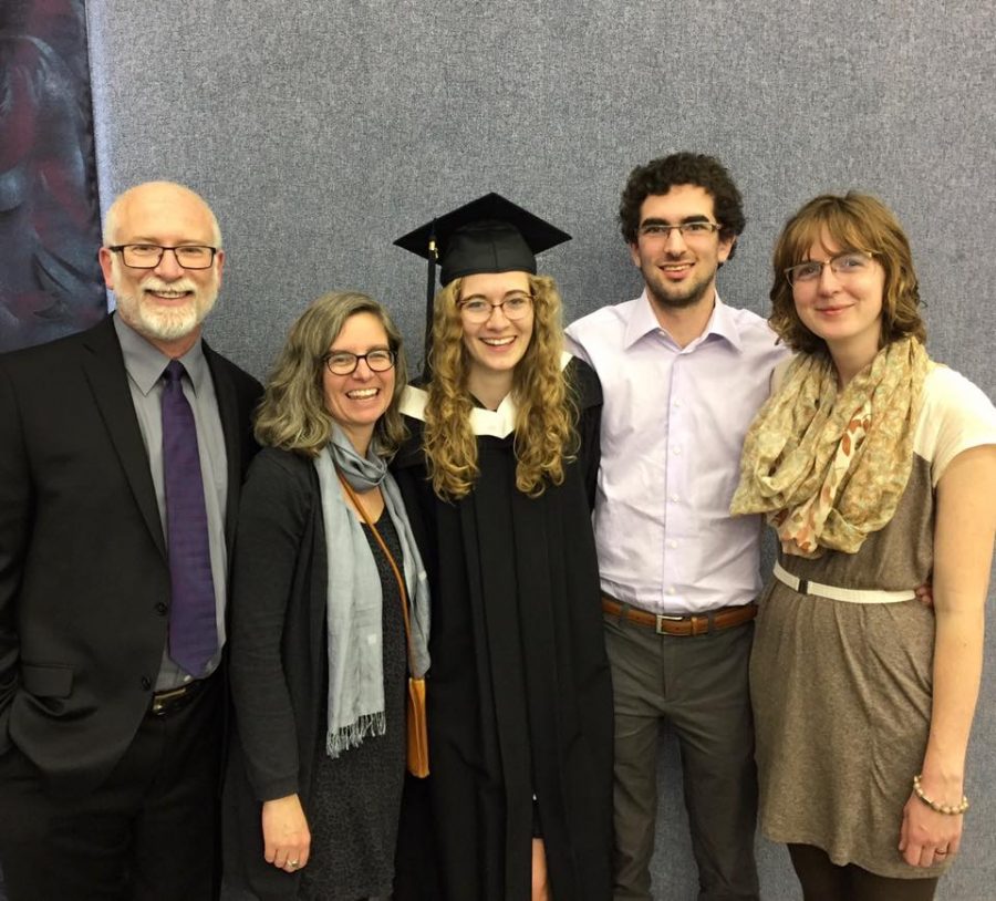 Emily Hamm, (centre), with her family on graduation day at Canadian Mennonite University in June, 2017.