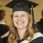 Laura Carr-Pries in her graduation gown and cap.