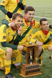 Ryan Jenson with teammates and MCAC trophy